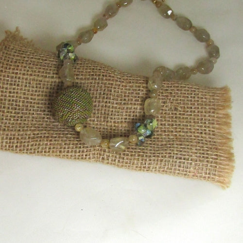Quartz Crystal Necklace with Green and Gold Beaded Bead Accent