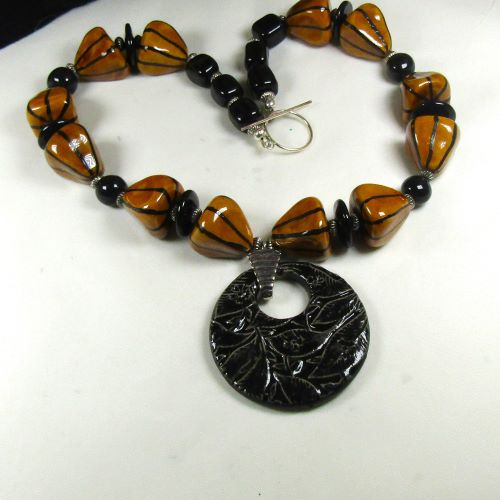 Honey and Black Kazuri Warrior Necklace with Fair Trade Pendant
