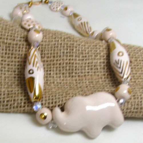Cream and gold fair trade bead Kazuri elephant necklace