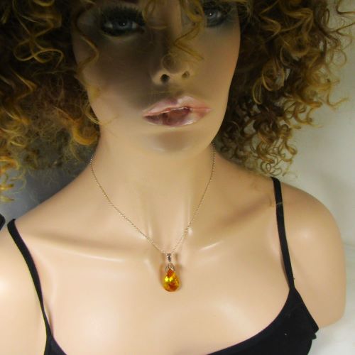 Gold Twisted Oval Crystal Pendant Necklace