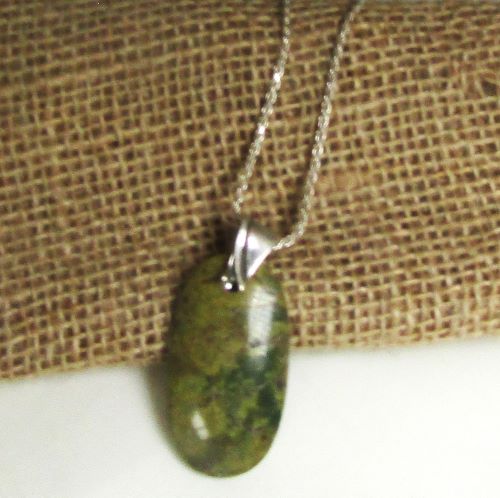 green gemstone pendant