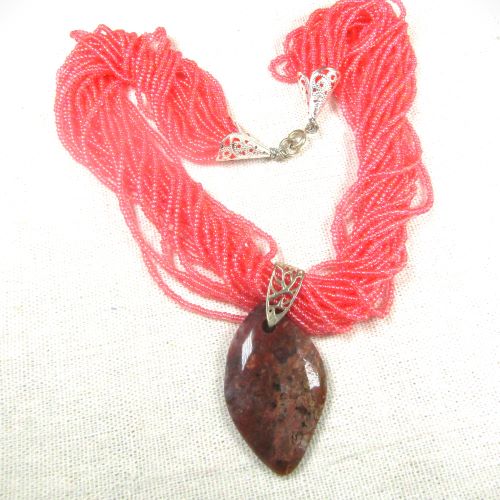 Pink Multi-strand necklace with gemstone pendant