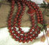 red multi-strand gemstone necklace