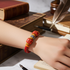 Unisex Red Braided Leather Bracelet Kazuri Bead Accents