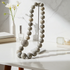 Silver and Rare Petrified Dinosaur Bone Bead Necklace