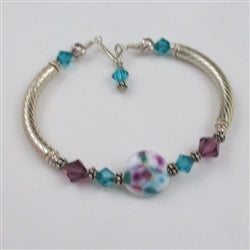 White swirled with turquoise and purple artisan bead bangle bracelet