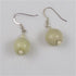 Handmade Kazuri bead cream earrings