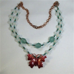 Buy Handcrafted copper butterfly & sea glass necklace