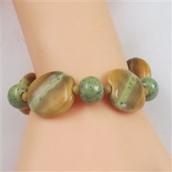 Fair trade handmade Kazuri bead bracelet in mustard & green