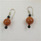 Classic Kazuri honey earrings with black onyx accents