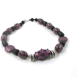 Buy handcrafted purple & black necklace in handmade fair trade Kazuri bead accented with handmade artisan bead.