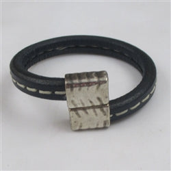 Navy blue leather cord bracelet with unique off set clasp