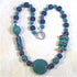 Handmade fair trade bead kazuri neck wear in turquoise & purple