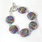 Buy pretty handmade purple, blue & green Kazuri fair trade bracelet