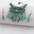 Handcrafted antique brass with turquoise patina silver focus accented with sea glass teardrops