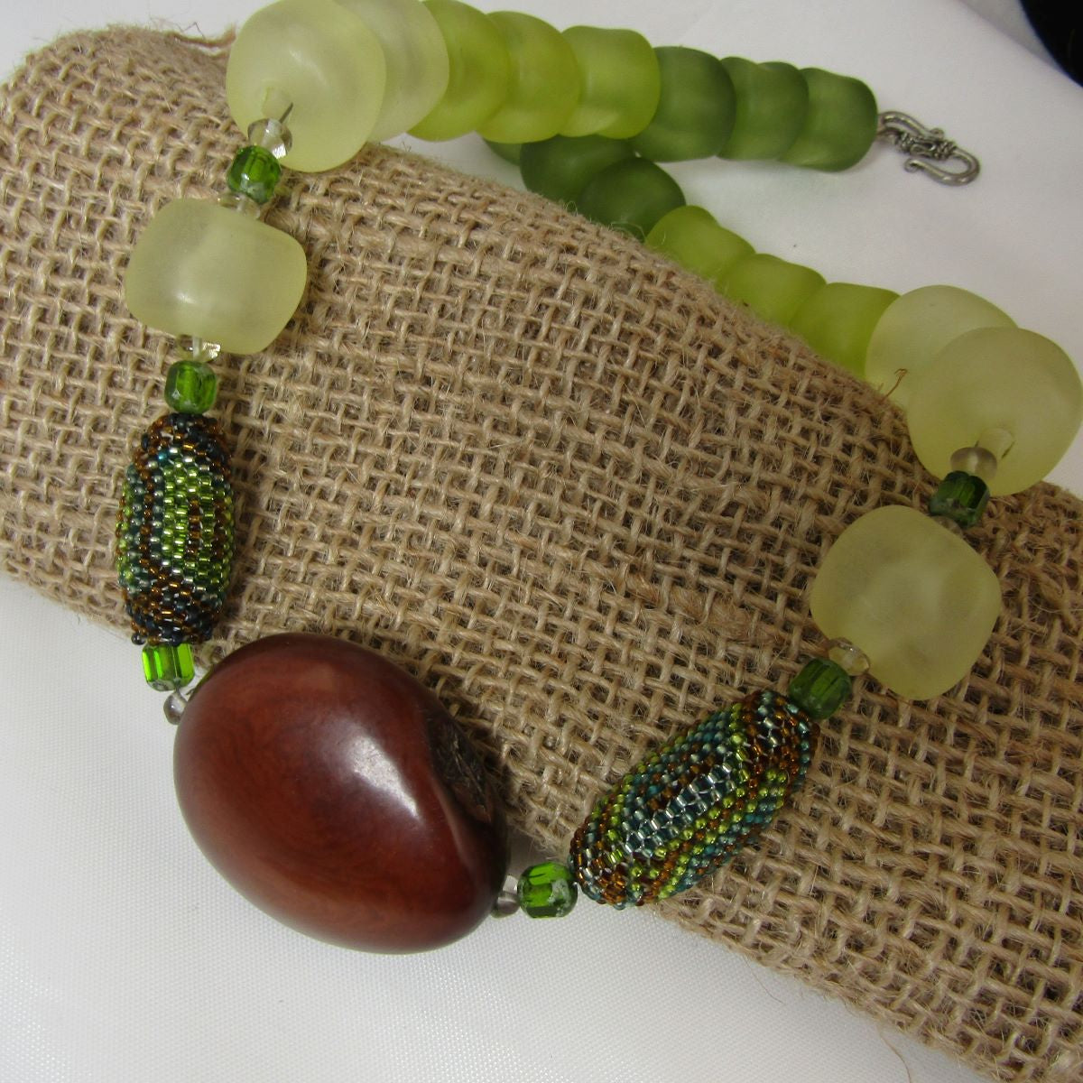 Eclectic Handmade Necklace in  Green with  Brown Tagua Nut