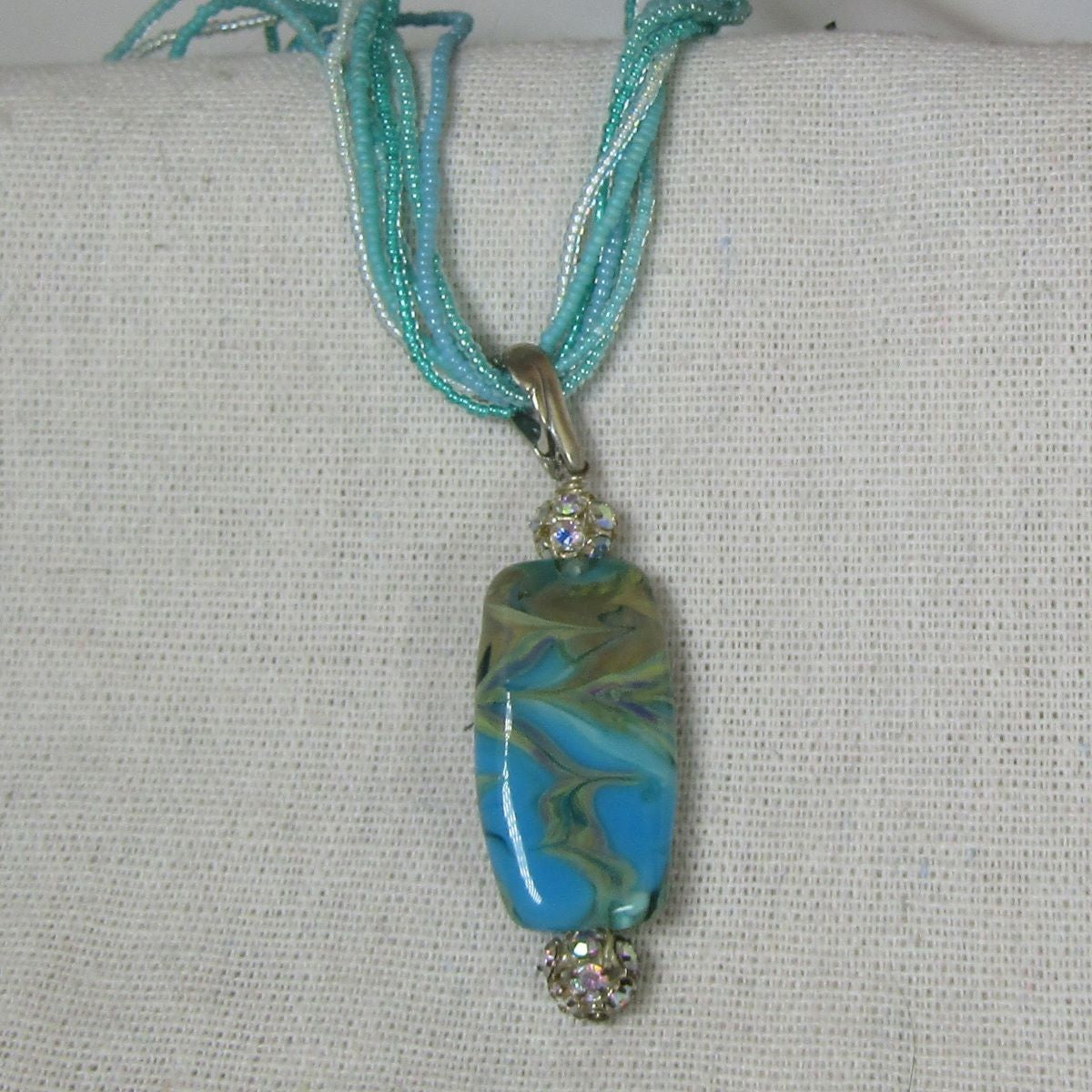 Exotic Aqua Lampwork Pendant on Aqua Seed Bead Necklace - VP's Jewelry