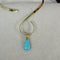 Kingman Turquoise Handcut Teardrop Pendant on Unique Gold Choker