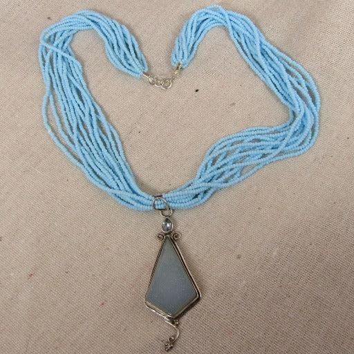 Blue Druzy Pendant on Blue Multi-strand Necklace