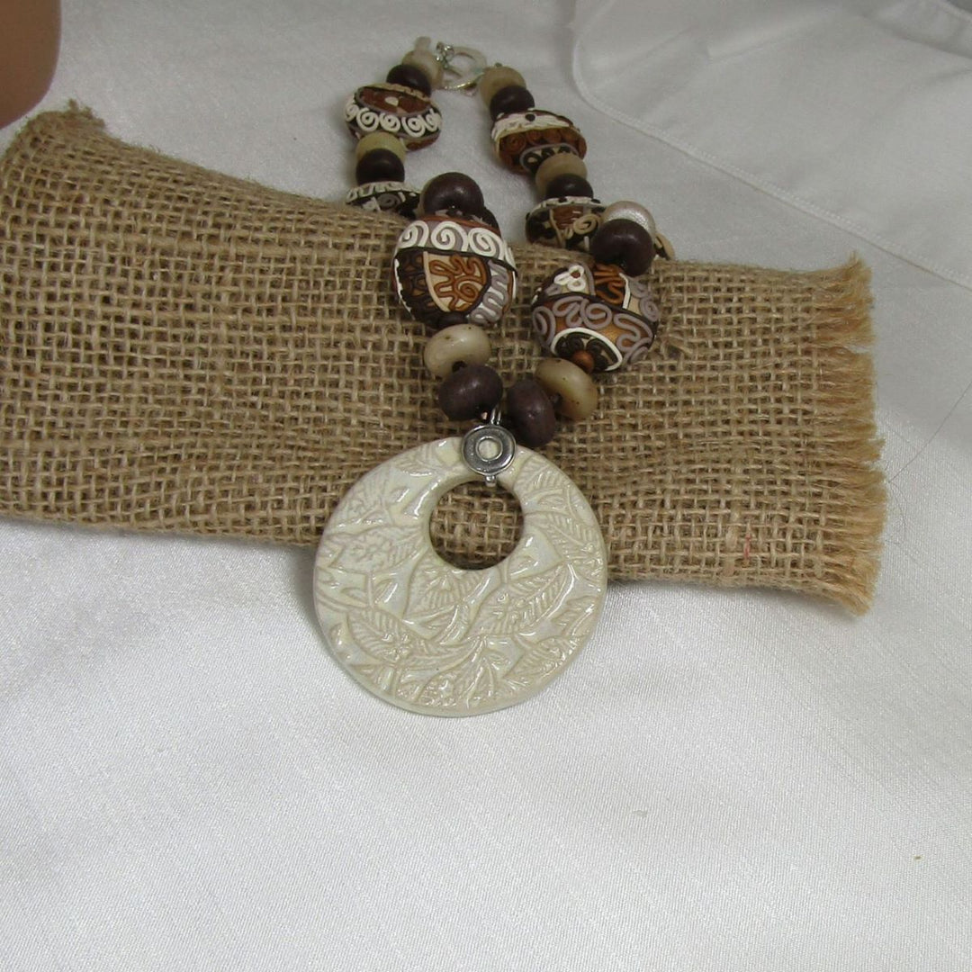 Brown & Cream fair trade bed necklace with cream fair trade bead big Pendant 