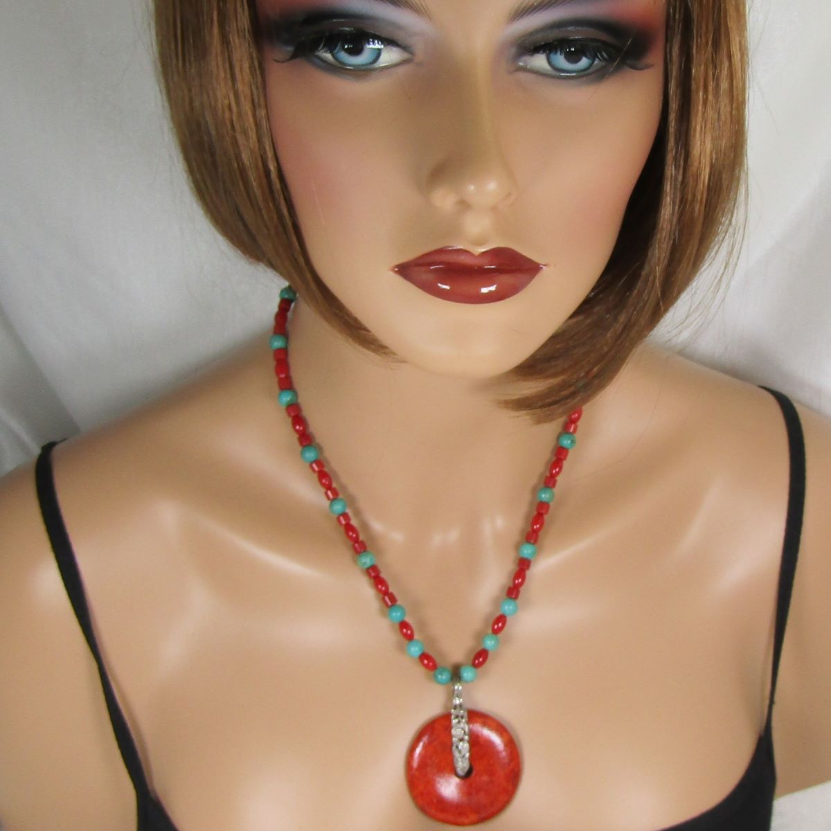 Handcrafted Turquoise Necklace with Red Pendant