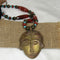 Big Bold Brass Pendant on Beaded Necklace