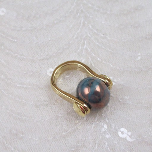 teal gold ring